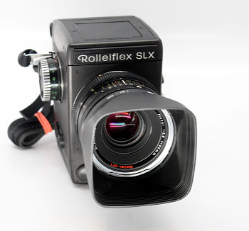 Rolleiflex SLX 6x6 Objektiv Planar 80mm 1.2,8F +Nabíječka 2x Adapter Film